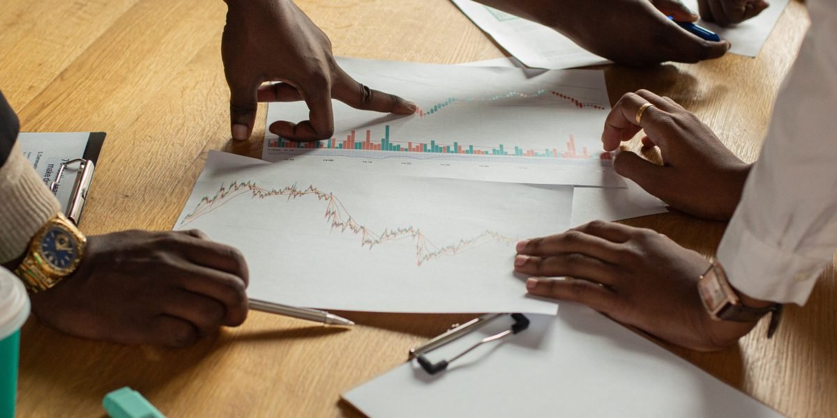A diverse team collaborating on a project, representing varied needs for AI tools in a startup.