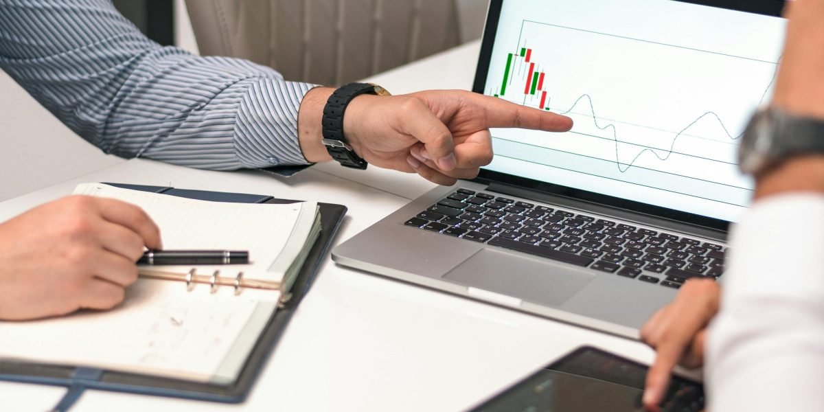 A business team collaborating to analyze global market trends and strategic investments.