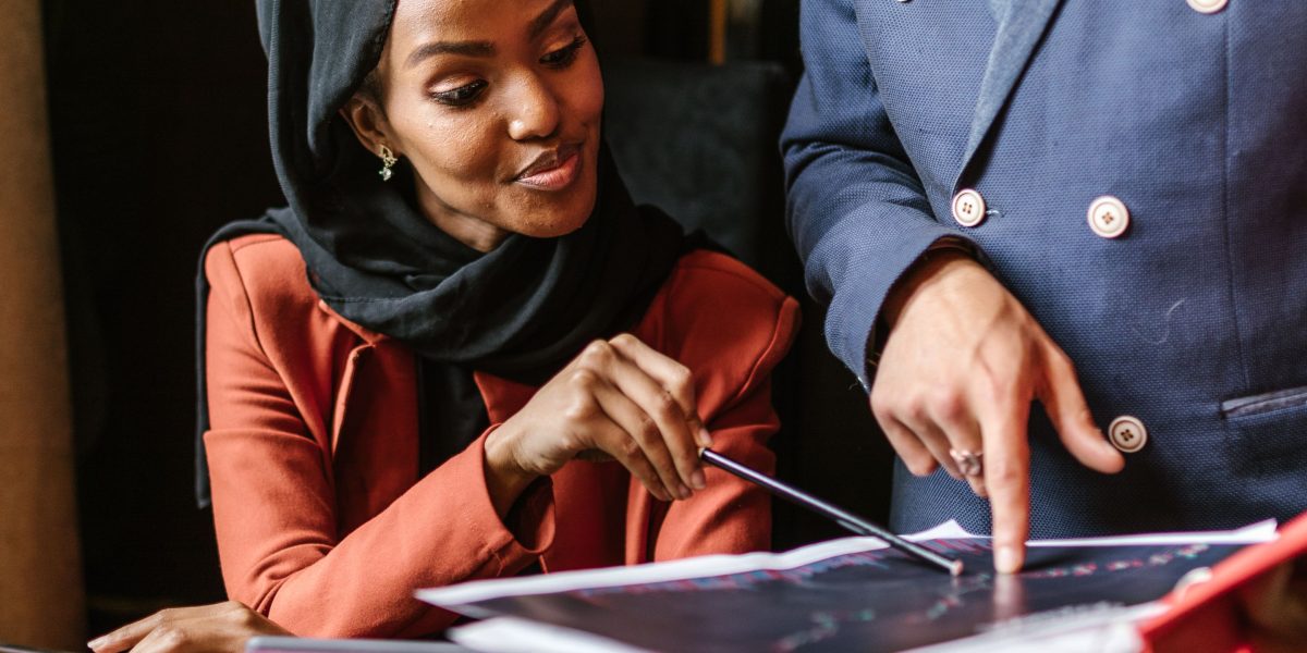 A business leader reviewing a concise report, representing the need for fast, actionable intelligence in professional settings.