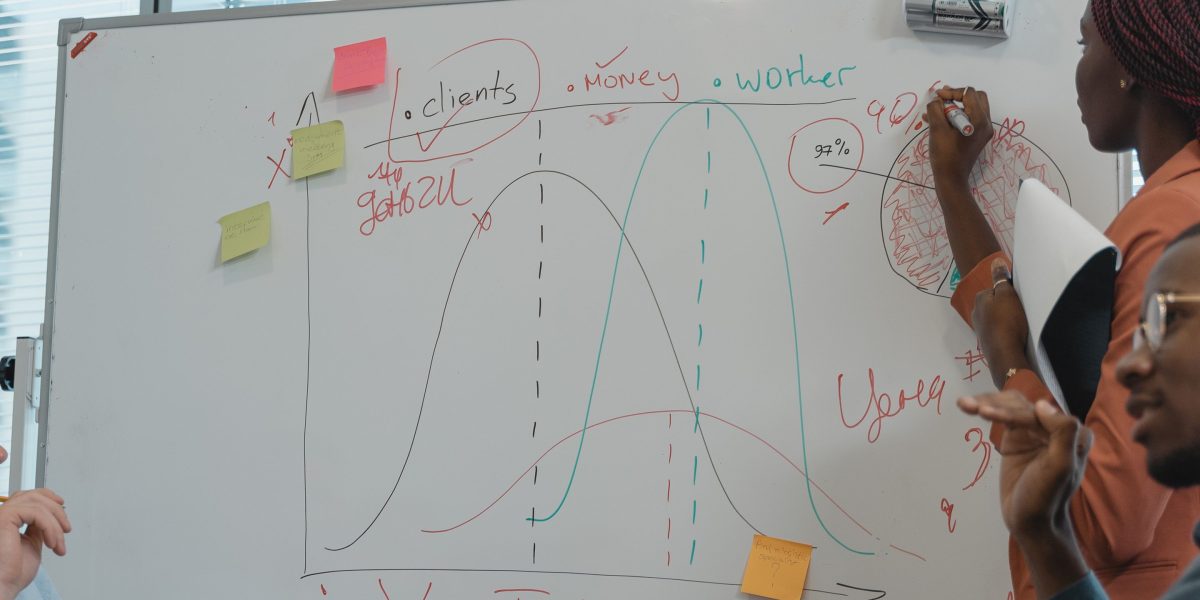 A team engaged in a collaborative discussion, emphasizing the value of shared understanding and clear definitions.