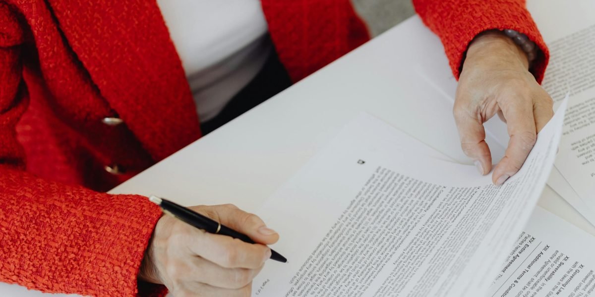 A person confidently reviews data to make informed strategic decisions for their business.