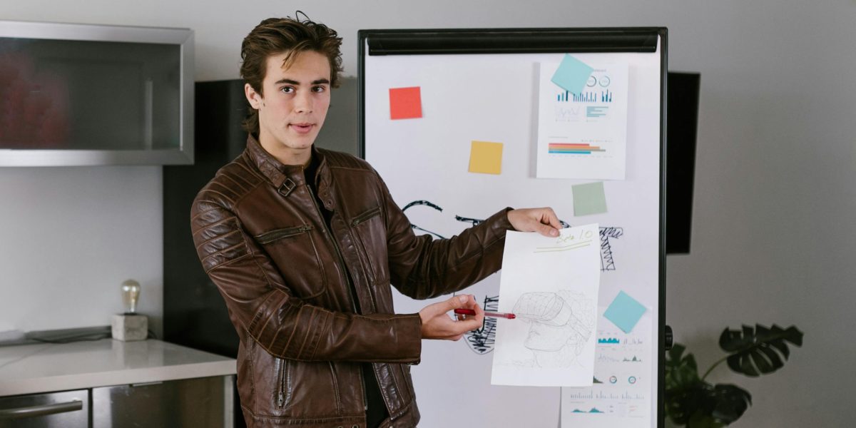 A founder confidently presents an innovative product idea, outlining their vision for agentic AI features.