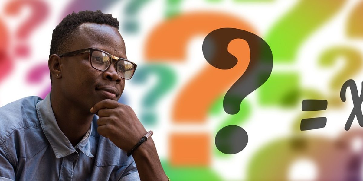 A person in deep thought, reflecting on complex questions about origin and definition.