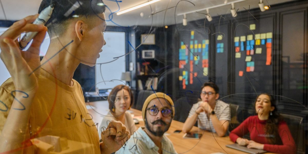 A team collaborating to envision and plan future growth and innovation in a bustling city.