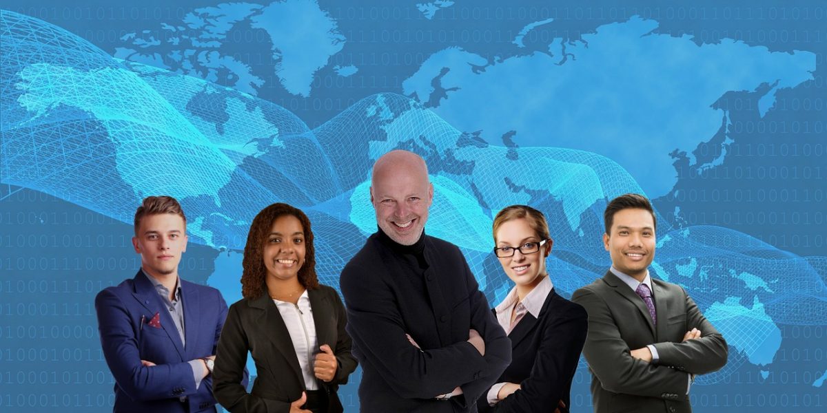 A focused team of cybersecurity professionals working together in a security operations center, addressing emerging threats.