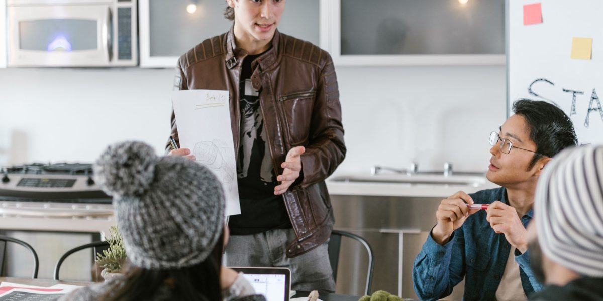 An entrepreneur confidently presents innovative ideas to an engaged audience.
