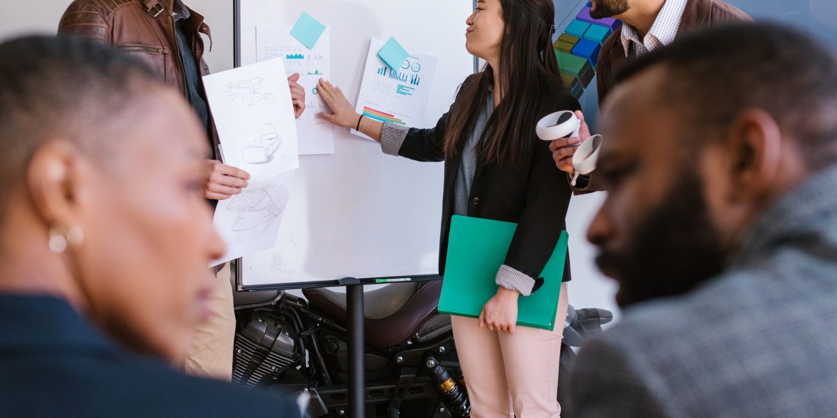 Investors attentively listen and evaluate a startup pitch, considering new opportunities.