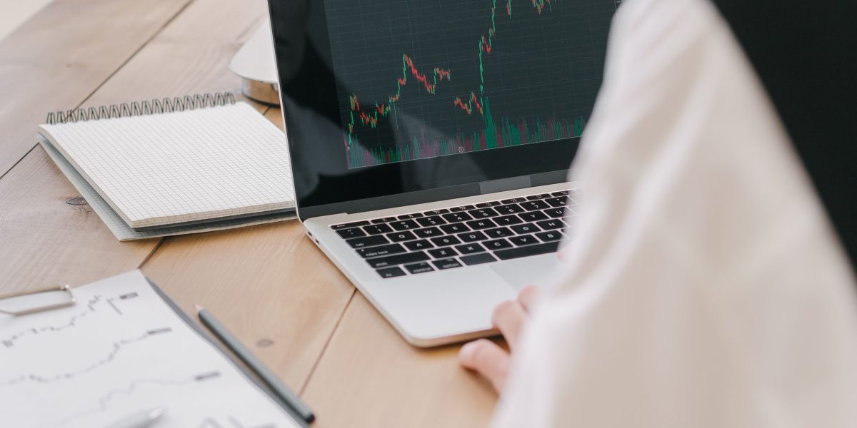 A business professional analyzing market data and trends, leveraging insights from competitive intelligence.