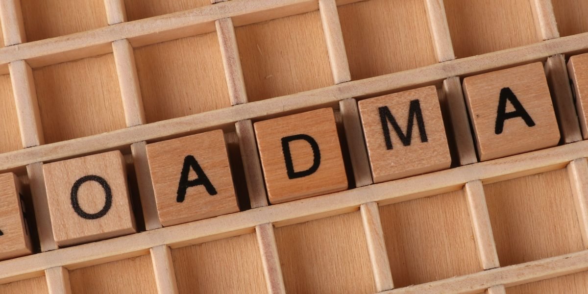 An individual thoughtfully plans their career path, reflecting the article's guidance for data architects.
