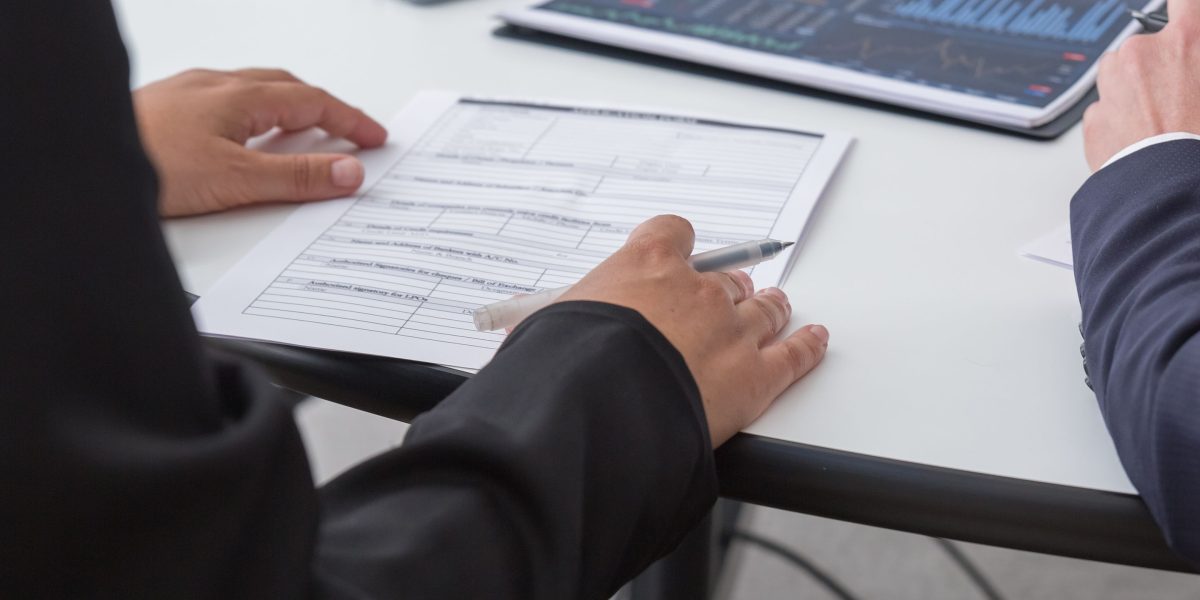 A business professional attentively reviewing a dashboard display, signifying clear data insights and informed decision-making.