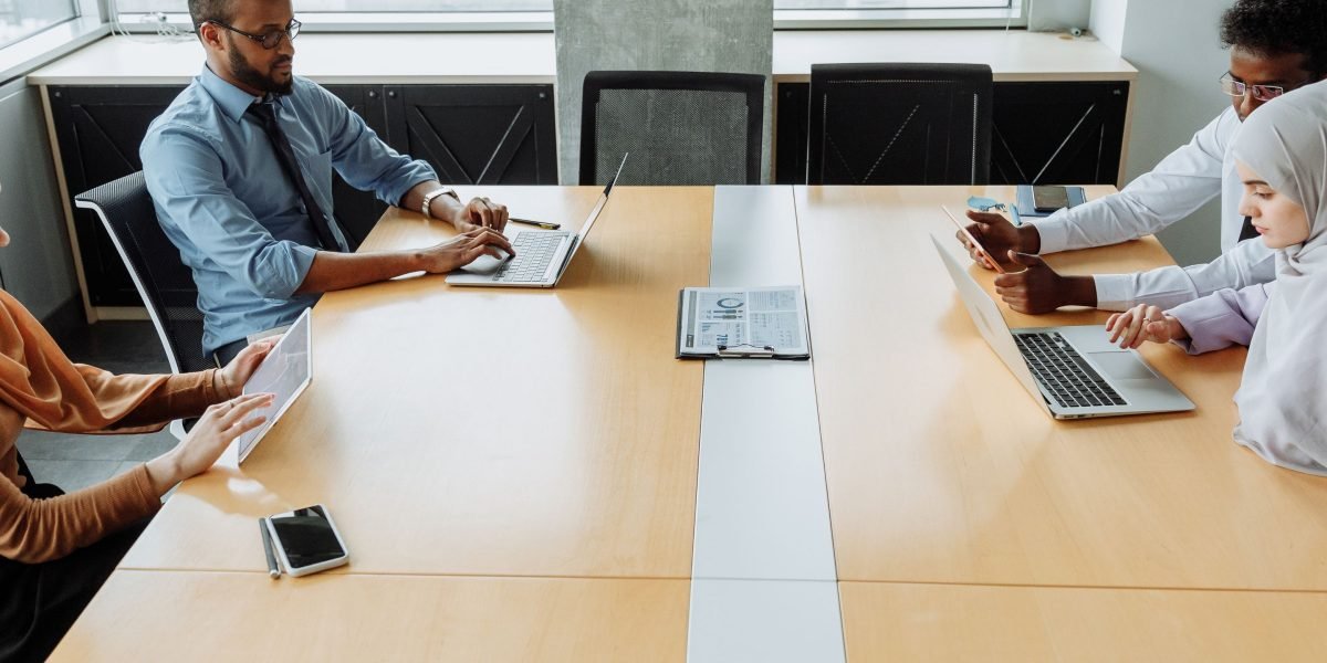 A diverse team collaborating effectively across different locations, symbolizing global work AI.