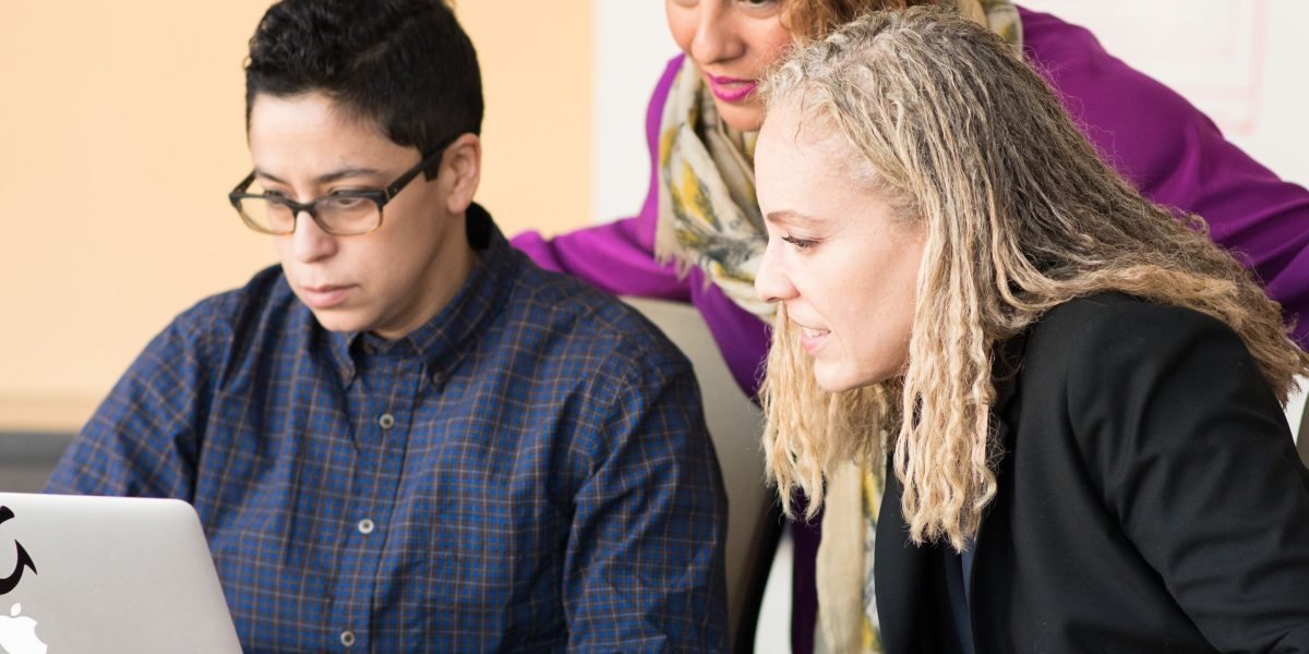 Experienced mentors provide guidance to a startup team navigating the challenges of innovation and growth.