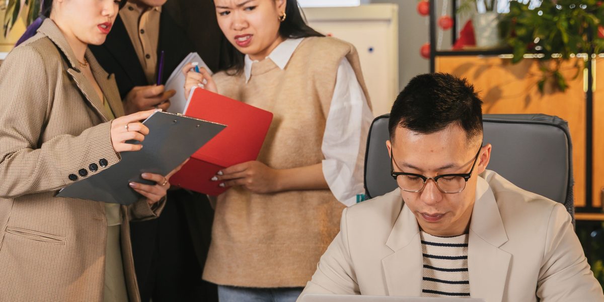 A startup team collaborates to prioritize essential tools, balancing budget and time constraints for their business growth.
