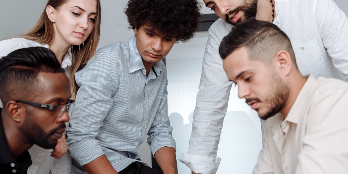 Professionals collaborate on strategies for business expansion and capital flow.