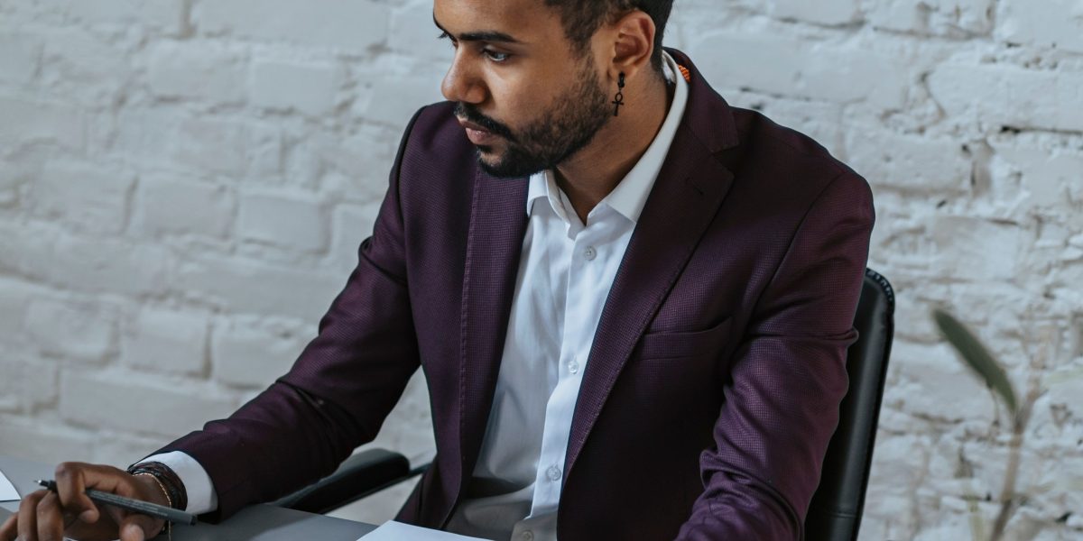 A business professional intensely analyzes financial reports and data, a crucial step in investor due diligence.