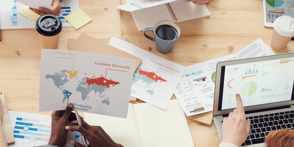 A diverse team actively brainstorming, symbolizing the search for new investment opportunities.