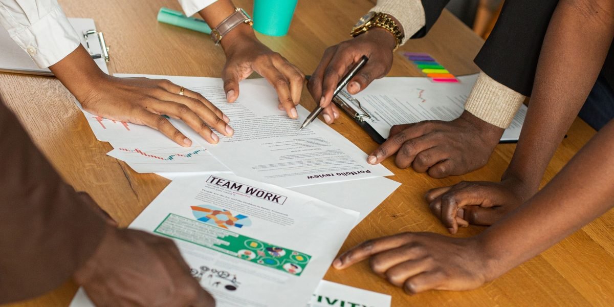 A diverse team collaborating on new ideas, symbolizing the vibrant innovation fostered within a thriving tech city.