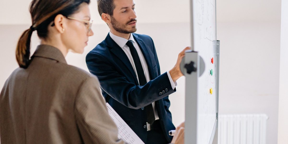 A team collaborates, discussing the pros and cons of different AI platform choices and their strategic implications.