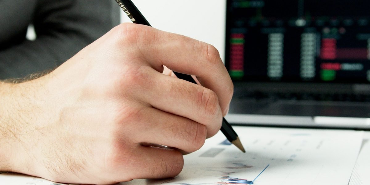 A person focused on analyzing various external data sources to gain a comprehensive understanding of market trends.
